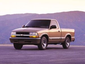 A stock photo of a tan Chevy S-10 truck