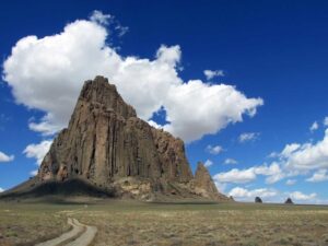 Photo of Shiprock and the road leading up to it in New Mexico