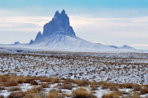 Photo of Shiprock on a snowy day.